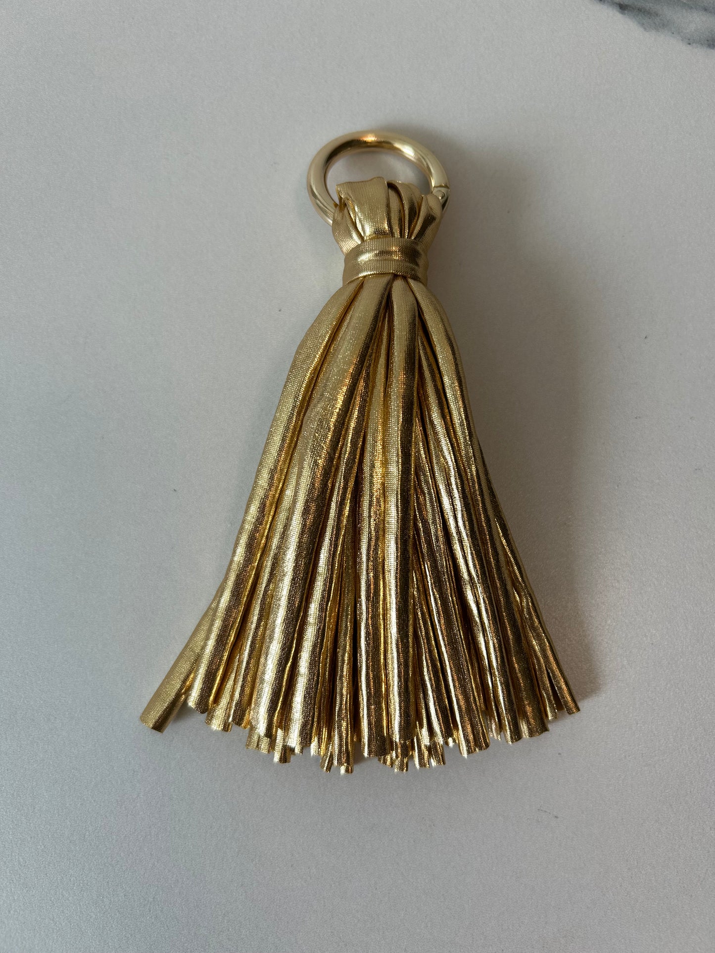 pup fabric tassel $20